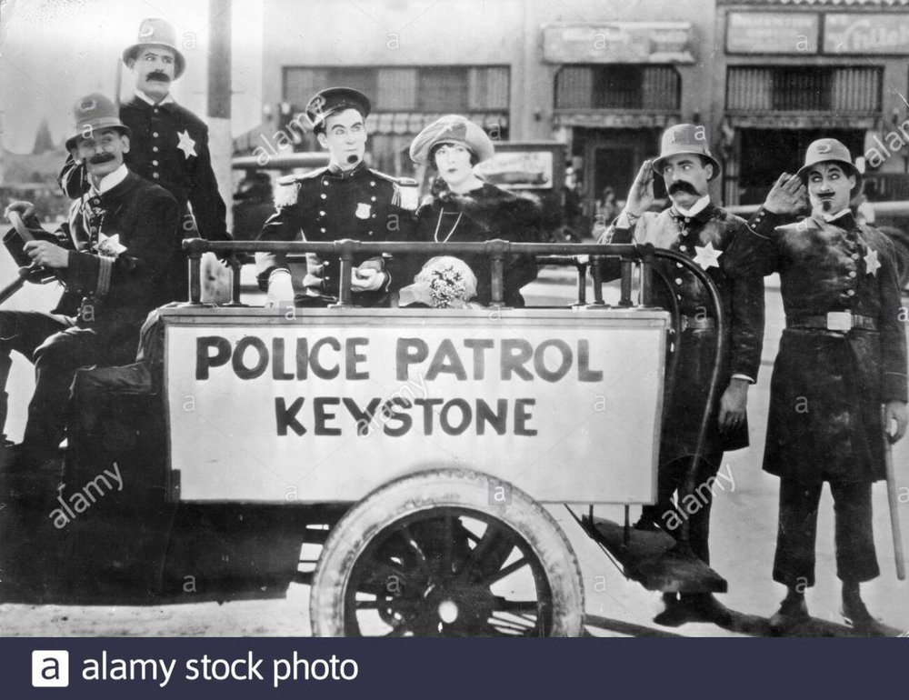 keystone-cops-tillies-punctured-romance-still-from-the-1914-mack-sennett-first-full-length-silent-movie-with-the-iconic-incompetent-police-and-starring-mabel-normand-and-charlie-chaplin-2BTBRKN.jpg